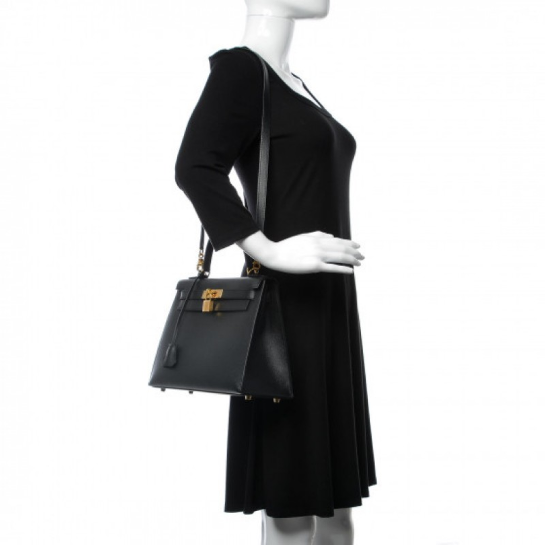 Hermès – Kelly 25 bag in black with gold-colored hardware
