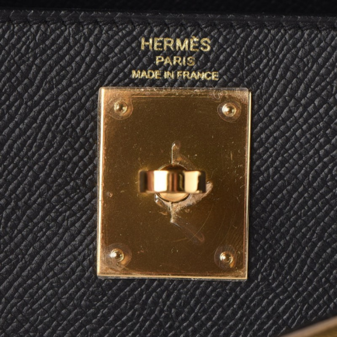 Hermès – Kelly 25 bag in black with gold-colored hardware