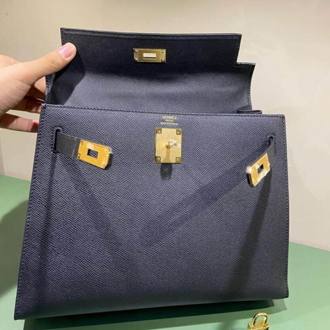 Hermès – Kelly 25 bag in black with gold-colored hardware